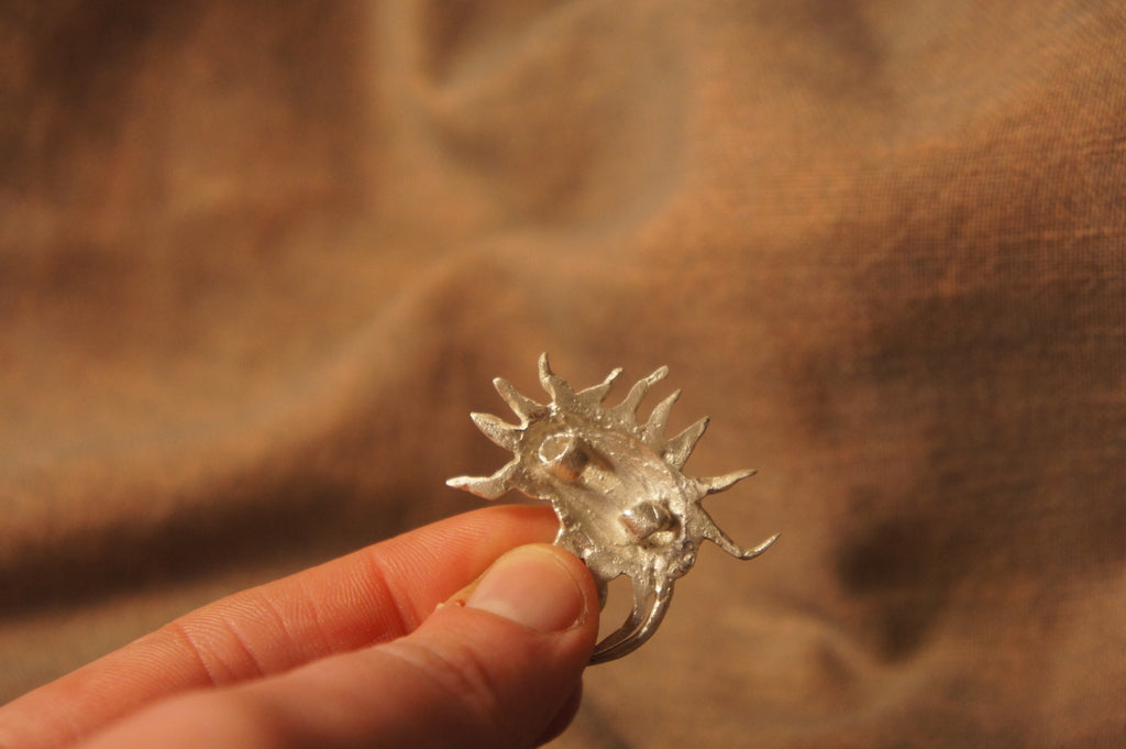 Mealy bug brooch