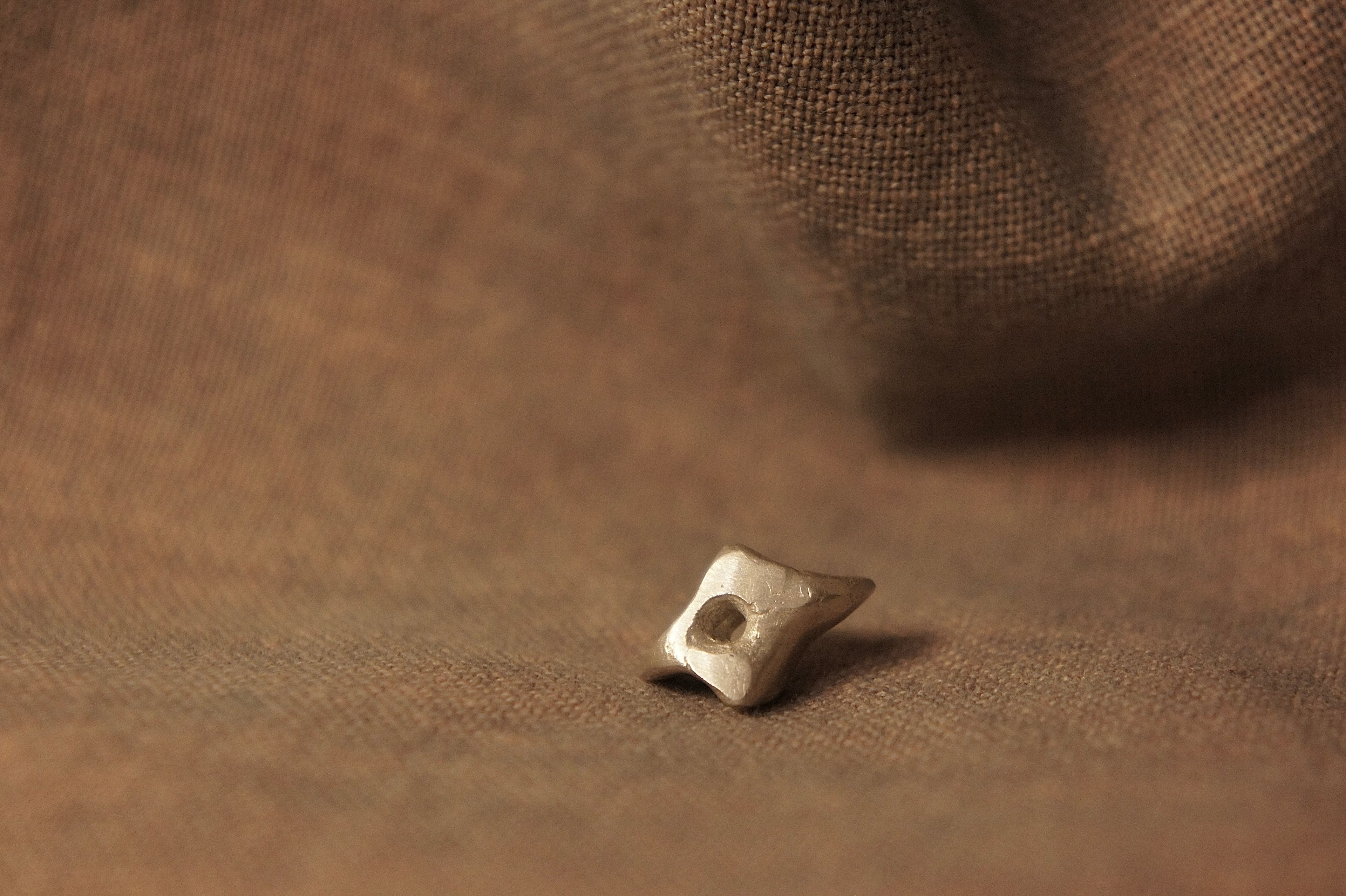 Hagstone brooch pendant