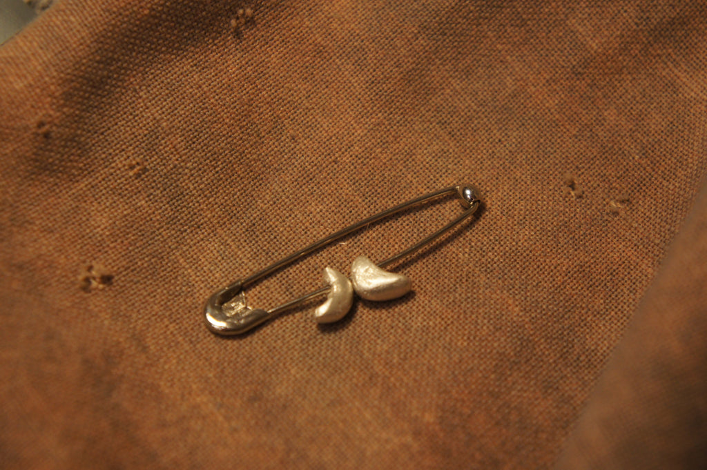 Fate brooch